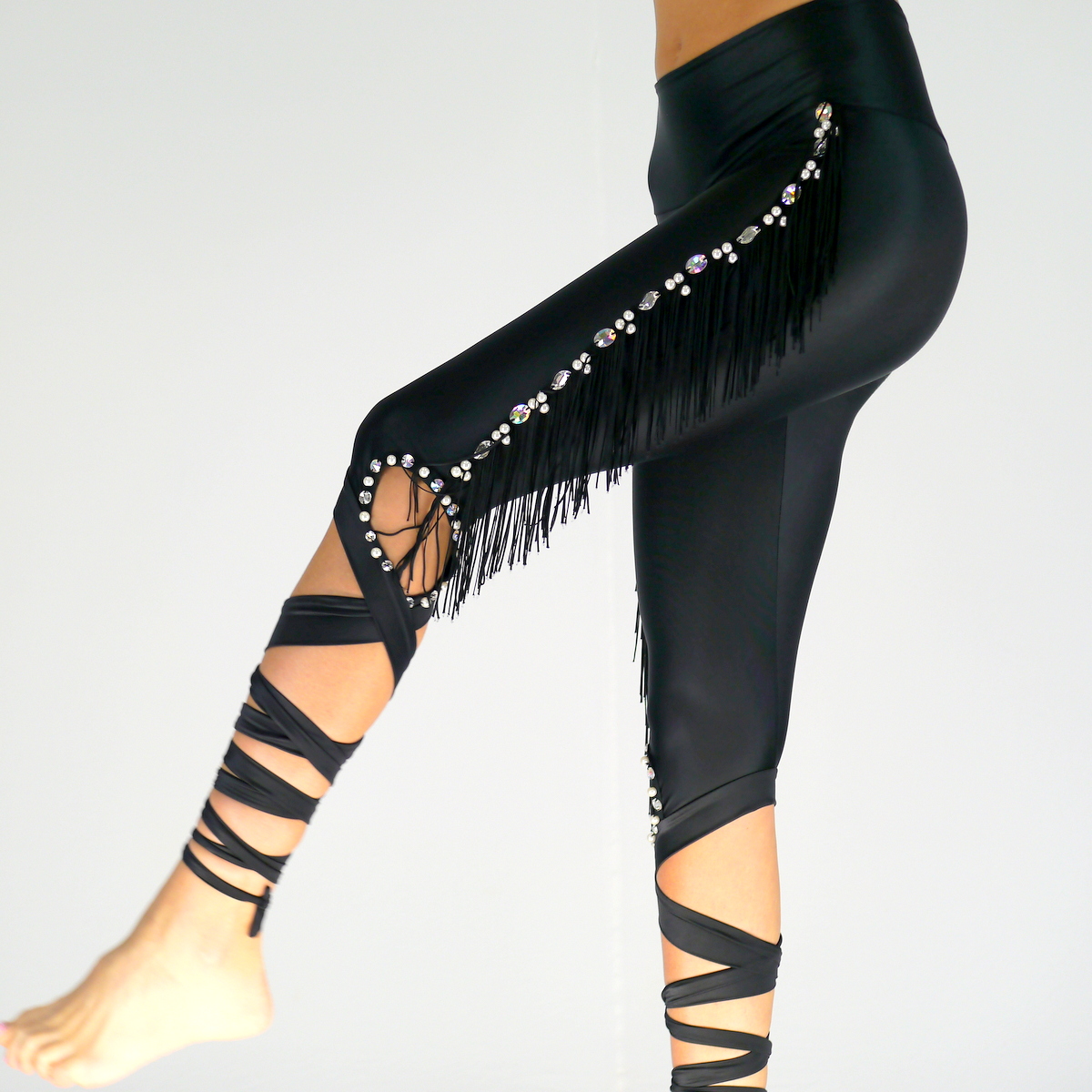 Schwarze Capri Leggings mit Fransen und Strass Steine